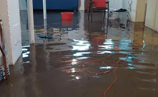 Basement with boiler, cabinets and washing machine completely flooded in Birmingham, AL